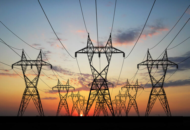 3D Electric powerlines over sunrise