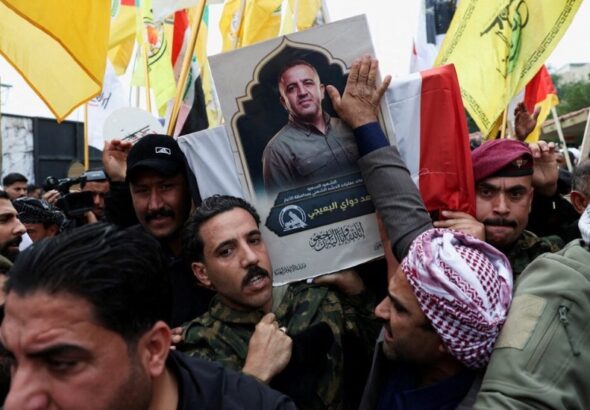 Mourners-carry-the-coffin-of-Saad-al-Baiji-the-Popular-Mobilisation-Forces-Anbar-operations-commander-who-was-killed-in-airstrikes-that-targeted-a-PMF-site-in-Iraqs-western-Anbar-provinc