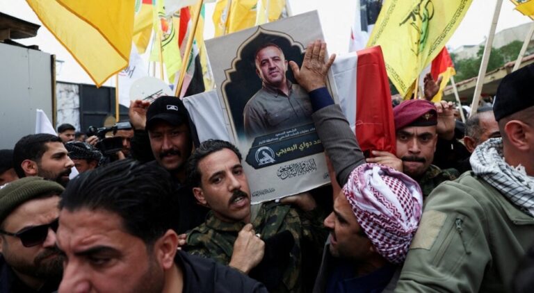 Mourners-carry-the-coffin-of-Saad-al-Baiji-the-Popular-Mobilisation-Forces-Anbar-operations-commander-who-was-killed-in-airstrikes-that-targeted-a-PMF-site-in-Iraqs-western-Anbar-provinc