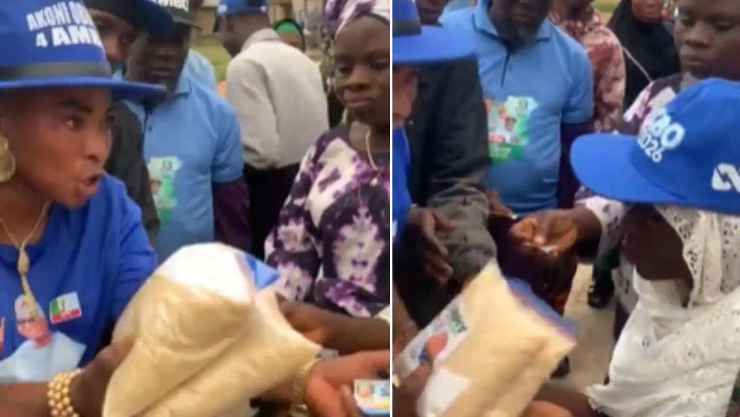 APC_woman_shares_rice_to_Osun_residents